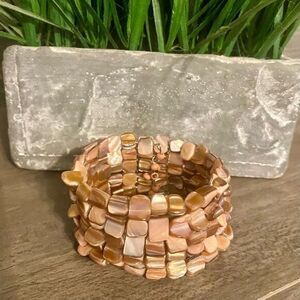 - Women’s coral and brown cuff‎ bracelet